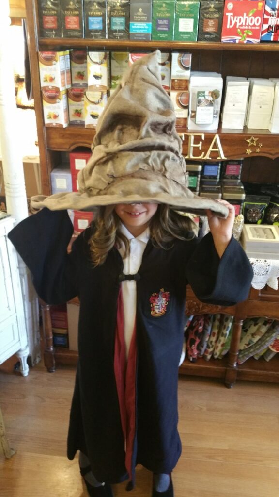 girl with wizard hat at harry potter's birthday party